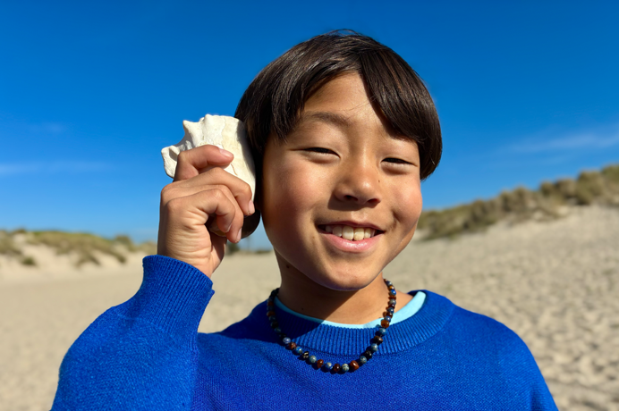 Yeni nesil portre özelliği kullanılarak 48 MP Fusion kamerayla çekilmiş bir fotoğraf, odak bir kişinin yüzünde