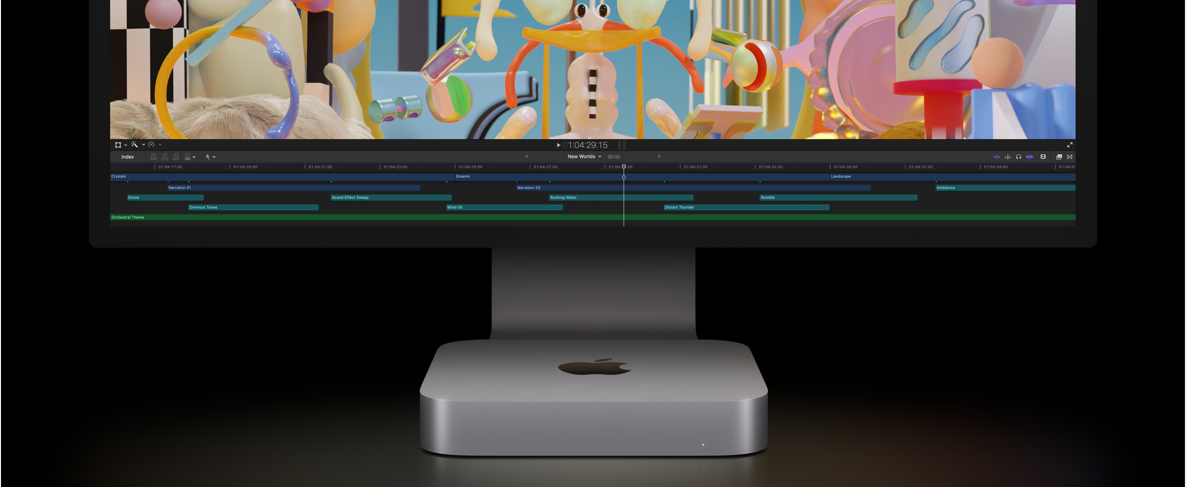Mac mini’nin ve Final Cut Pro’da bir video düzenleme projesini gösteren Studio Display’in önden görünümü.