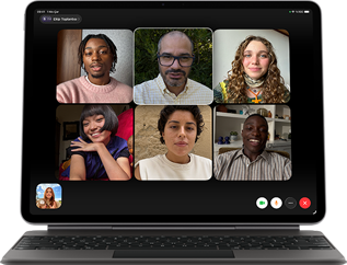 Magic Keyboard’a takılı iPad Air, Siyah renk, ekranda Grup FaceTime görüşmesi