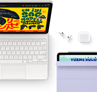 Magic Keyboard’a takılı Yıldız Işığı rengi iPad Air’in ekranında renkli grafikler, Airpods Pro ve Apple Pencil Pro aksesuarları