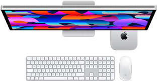 Studio Display’in altına yerleştirilmiş Mac mini, Sayısal Tuş Takımlı Magic Keyboard, Magic Mouse