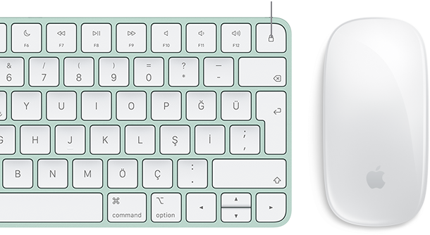 Yanında Magic Mouse bulunan Touch ID özellikli Magic Keyboard’un yakın çekim üstten görünümü.
