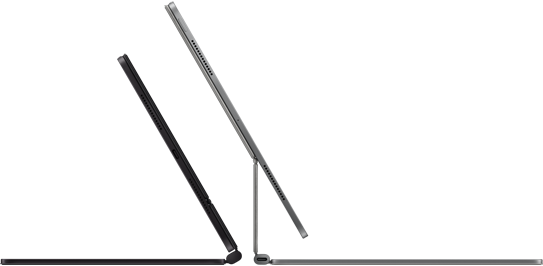 Uzay Siyahı ve Gümüş renklerinde iki Magic Keyboard’un bağlı olduğu sırt sırta duran iki iPad Pro