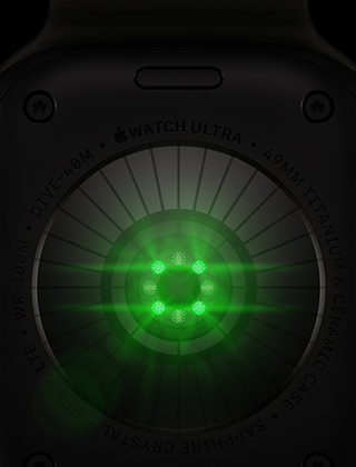 Apple Watch Ultra 4’ün arkadan görünümü, titanyum kasa, siyah renk, parlak yeşil LED ışıklara sahip birden fazla yuvarlak sensör